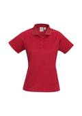 Womens Sprint Short Sleeve Polo - Red ||SRC=https://cdn.fashionbizapps.nz/honeybee/images/P300LS_bProduct_Red_01_B1kHLeb.jpg